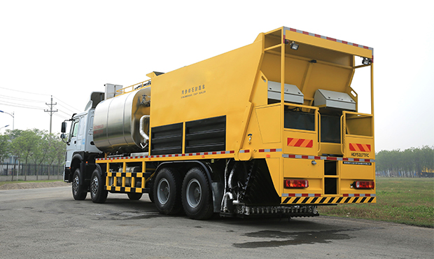 Синхронный битумощебнераспределитель